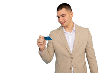 Young businessman holding a credit card confidently