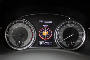 speedometer of a car on black background