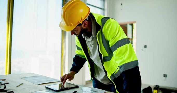 Man, engineer and scroll on tablet with architecture schedule, review blueprint and floor plan of construction. Male person, digital and documents with renovation design, information and maintenance