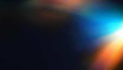 grainy colorful warm blue light leaks on black background with dust texture abstract damaged scratched retro film analog effect for using over photos as overlay or screen filter