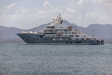 Helicopter on Mega Yacht deck anchored in Indian Bay, Saint Vincent and the Grenadines 