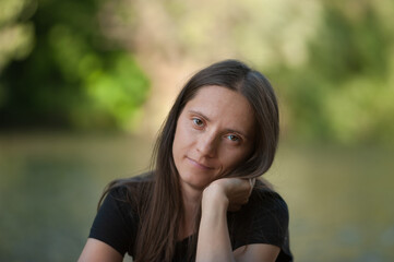 Portrait of a beautiful natural looking young woman with no makeup