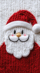 festive holiday knit sweater texture featuring cheerful Santa Claus design with red hat, white beard, and smiling face, evoking warmth and holiday spirit