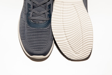 Stylish athletic shoes designed for comfort and performance, displaying their detailed texture and unique sole design