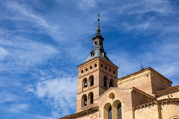 Fototapeta premium Iglesia de San Martin (Church of San Martín) Romanesque - Mudejar style bell tower with brick arches on stone columns, Segovia, Spain.