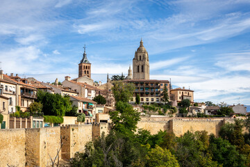 Fototapeta premium Segovia, Spain skyline with Segovia Cathedral at the top, churches, medieval architecture, residential buildings and city walls.