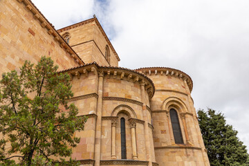 Basilica of San Vincente in Avila, Spain (The Basilica de los Santos Hermanos Martires, Vicente, Sabina y Cristeta), exterior facade apse view with carved stone openwork, Romanesque architecture.