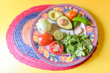 Fresh ingredients to prepare a delicious mexican guacamole 