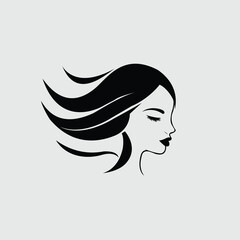 Elegant black and white silhouette of a woman's profile with flowing hair