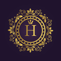 Ornate Gold Emblem with Floral Scrolls and Letter 'H' on Purple Background  
