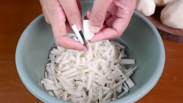 Slice the jicama thinly to make a salad