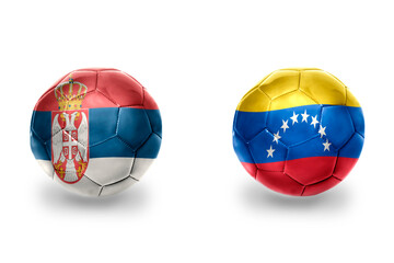 Fototapeta premium football balls with national flags of serbia and venezuela ,soccer teams. on the white background.