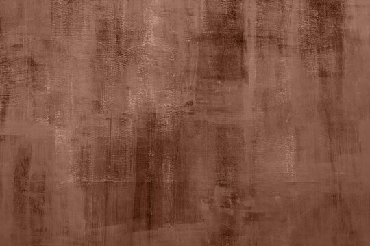 Fashionable color of 2025 - mocha mousse grungy background with old cement texture