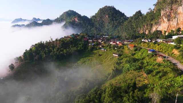 Aerial view of the beautiful morning mist over the mountains at Ban Ja Bo Village in Pang Ma Pha District, Mae Hong Son, Thailand