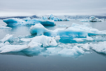 Icebergs swimming on Jokulsarlon glacier lagoon in Iceland