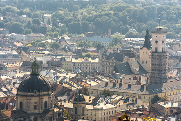Naklejka premium Lviv Cityscape. Ukraine. Lviv Old Town. City Hall Tower and Clock in background