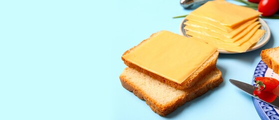 Tasty processed cheese and bread on blue background with space for text