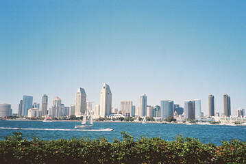 Fototapeta premium San Diego cityscape with boat on water