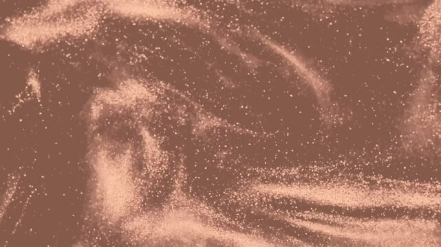 Abstract elegant, detailed mocha colored, pastel brown glitter particles flow with shallow depth of field underwater. Holiday magic shimmering luxury background. Year color concept 2025