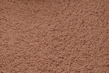 Cocoa powder surface close-up in color of the year 2025 mocha mousse