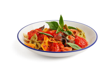 Bowl of delicious farfalle pasta with tomato and basil on white background
