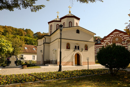 October 6, 2018 - Belgrade, Serbia. The church in the gate of the Rakovica Monastery with a part of the courtyard and the tombstones of His Holiness the Patriarch of the Serbian Gentleman Pavle 