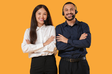 Technical support agents in headsets on yellow background