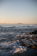 Crashing waves at sunrise