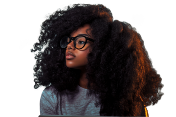 Afro-haired girl wearing glasses with a laptop on a png transparent background.