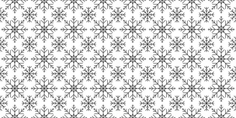 Winter hand drawn seamless pattern with snowflakes. Vector illustration.