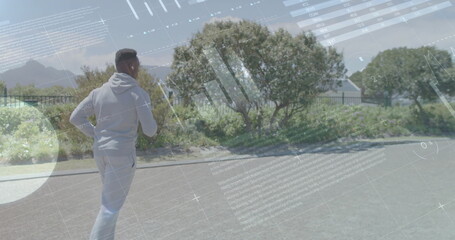 Image of diagrams and data processing over african american man running in park