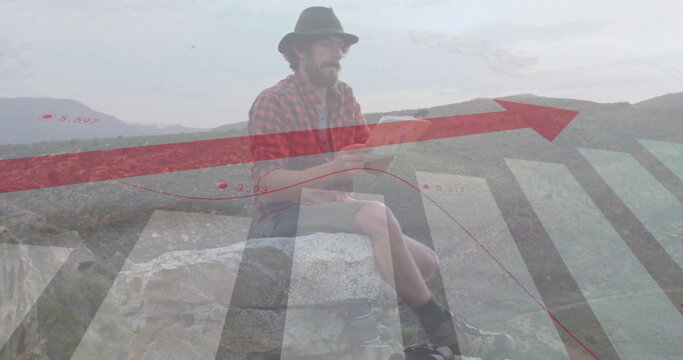 Image of financial data processing over caucasian man reading map in mountains