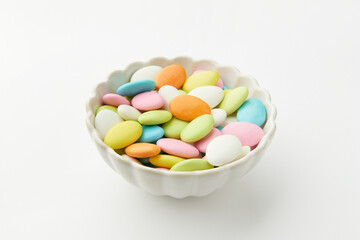 Traditional Easter Portuguese candies. Colorful Sweets in a bowl on white background