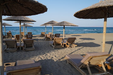 sunbeds and loungechairs on Ammoudara beach , Heraklion 