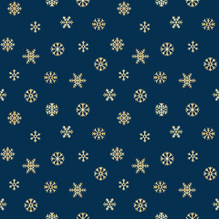 Blue and gold snowflakes holiday seamless pattern background