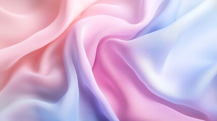 Fototapeta premium Soft pink and blue fabric with a flowing, rippling texture.