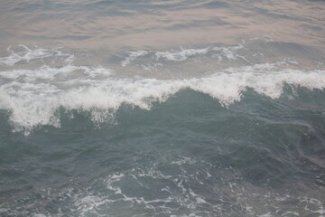 Fototapeta premium Image of waves crashing on Imrang Beach in Busan, Korea 