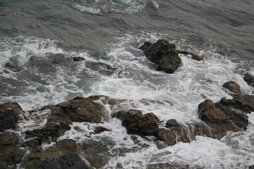 Fototapeta premium Image of waves crashing on Imrang Beach in Busan, Korea 