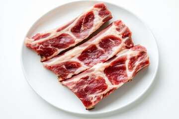 Obraz premium Sliced raw beef with marbling on white 