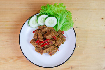 Indonesian Food - Tempeh Sweet Soy Sauce or Orek Tempe. Top View with Copy Space for Advertisement