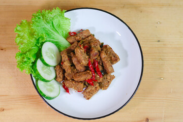 Orek tempe is a typical Indonesian food, specifically a Javanese dish made from tempeh which is cut into cubes or sliced ​​sticks and cooked with special spices, namely Javanese sugar and tamarind.