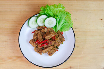 Tempe orek is a traditional Javanese Indonesian dish, served with rice as a side dish for breakfast, lunch or dinner