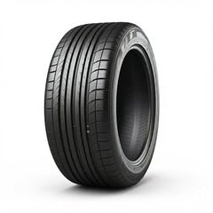 Obraz premium New car tire standing upright against a white background