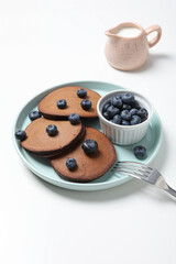 Chocolate pancakes, tasty breakfast, concept of delicious food
