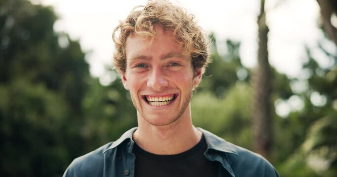 Outdoor, happy man and face with smile for holiday, vacation and confidence with satisfaction. Nature, male person and laughing in portrait for weekend, travel and positive with pride in Australia