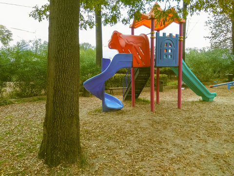 An empty playground in serene silence evokes nostalgia and quiet reflection