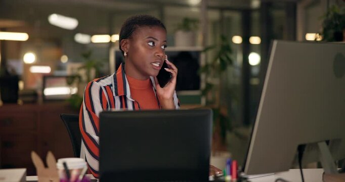 Night, phone call and thinking with designer black woman in office for communication or web development. Computer, conversation and idea with employee in creative workplace for negotiation or update