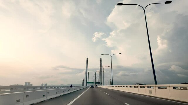 Dashboard view while driving on Penang's Second Bridge, also known as Sultan Abdul Halim Muadzam Shah Bridge..