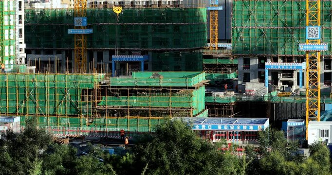 Busy Construction site Environment, workers and unfinished building