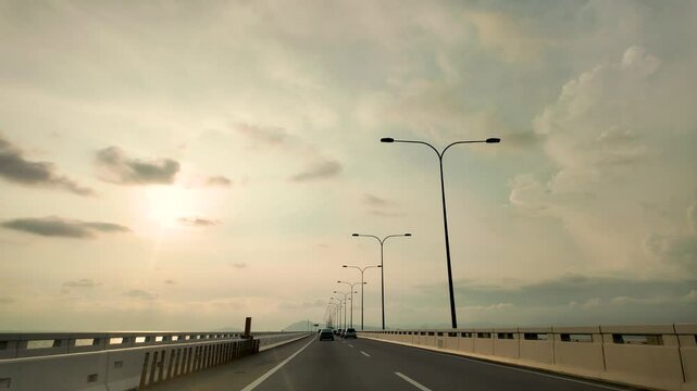 Dashboard view while driving on Penang's Second Bridge, also known as Sultan Abdul Halim Muadzam Shah Bridge..